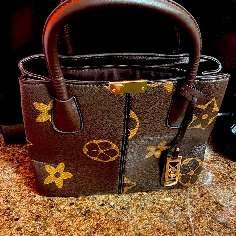 Womens handbag with shoulder strap